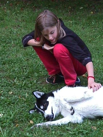 Foto des Tages vom 17.08.2000: Freundschaft zwischen Hund und Kind